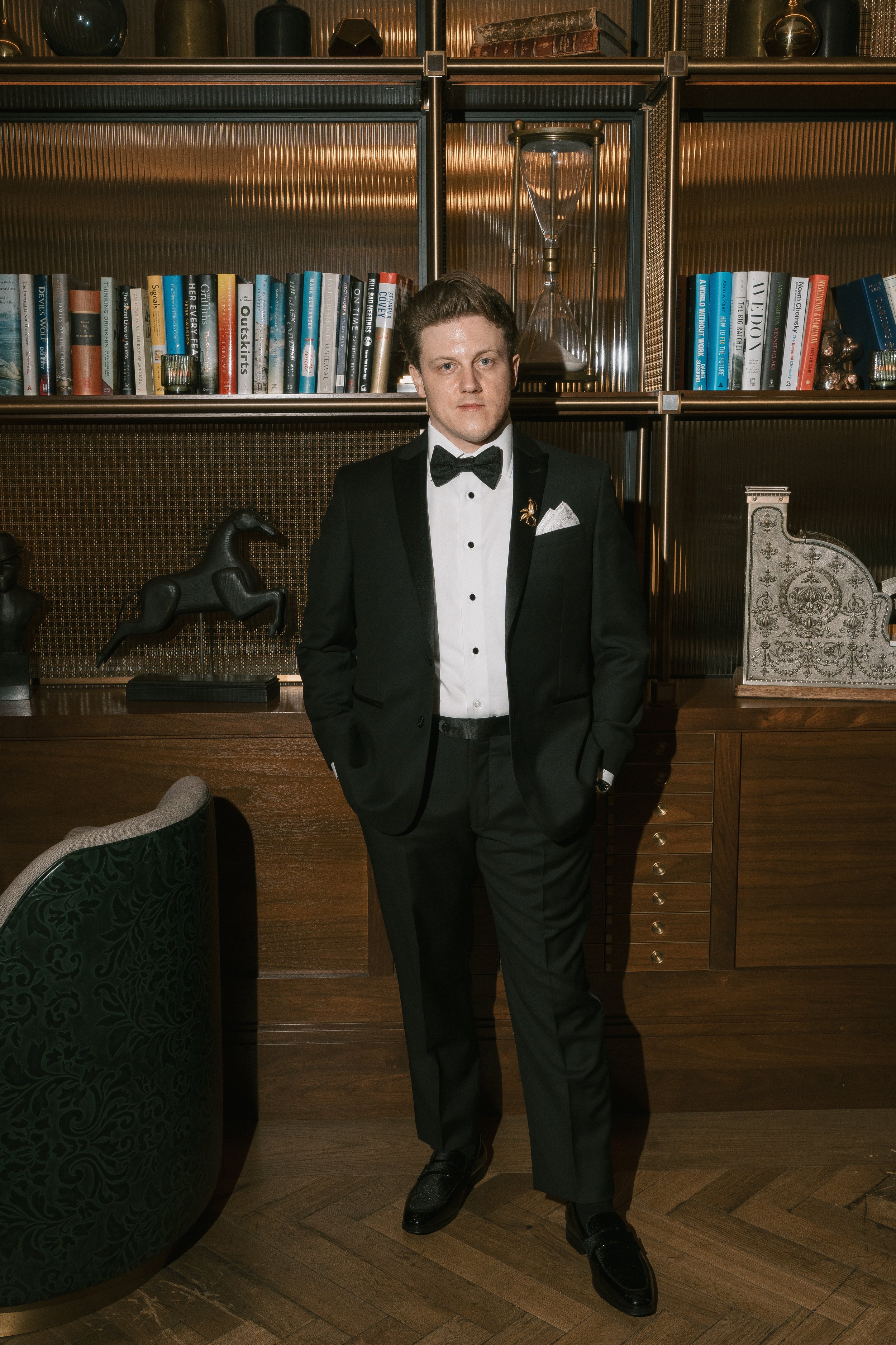 bookshelf-groom-wedding-portraits-the-fed-boston.jpeg