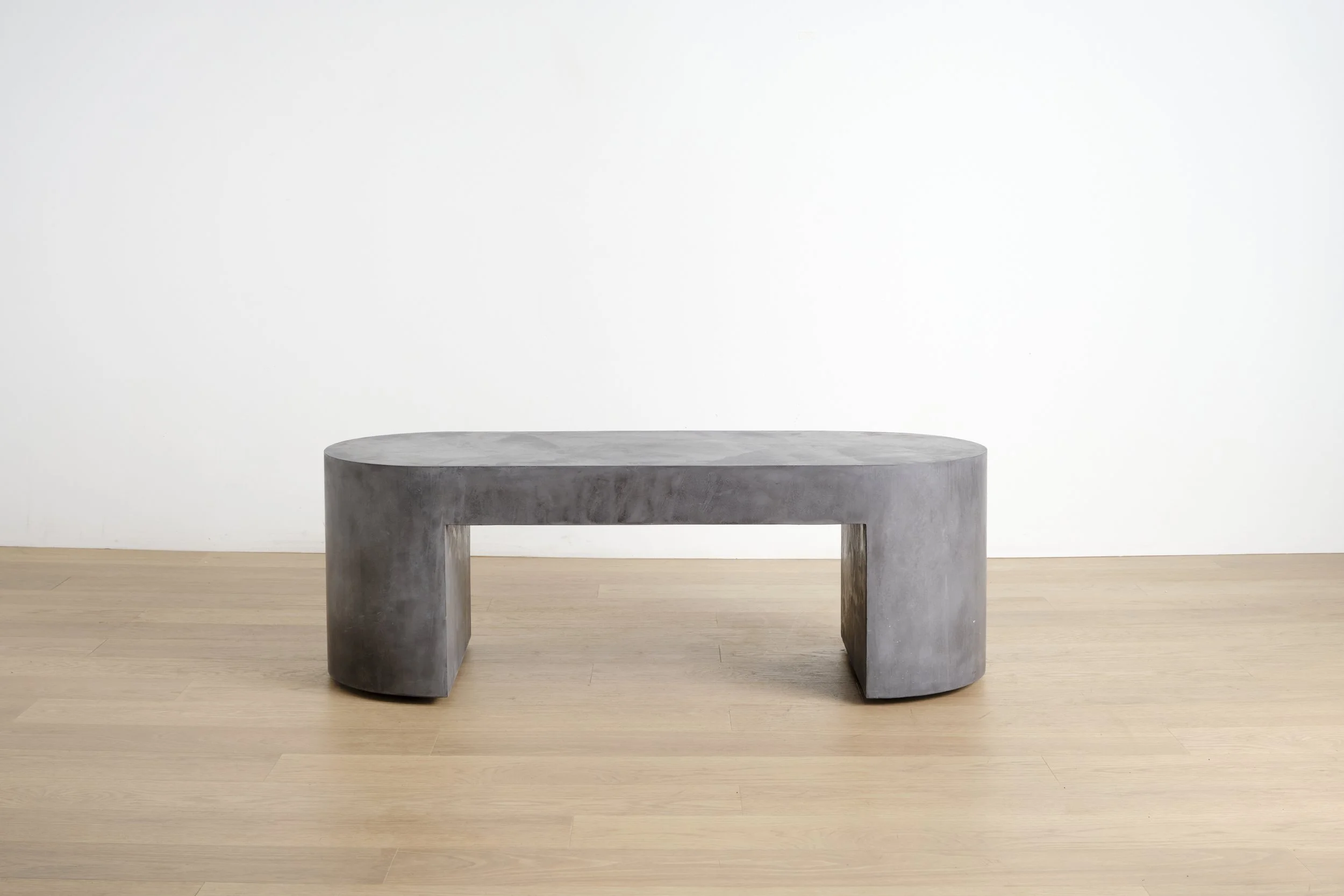 Rollerbench in Charcoal — mobile concrete bench on recessed casters, handcrafted in NYC.