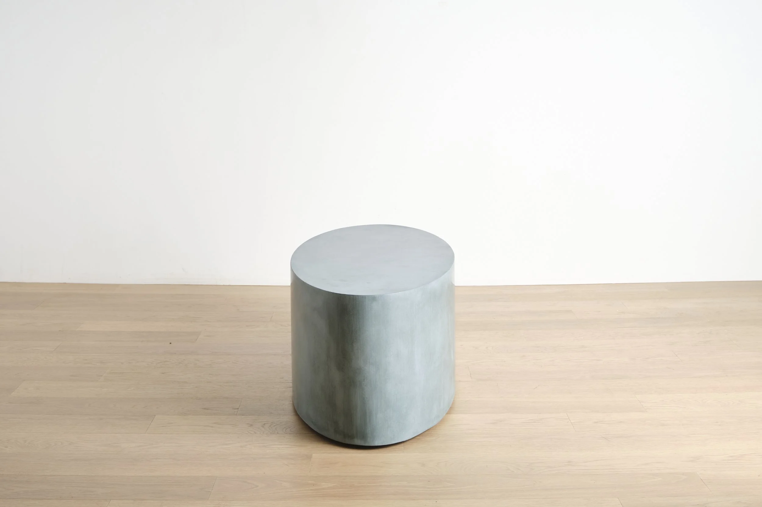 Elliptical, a mobile concrete coffee table in Teal color