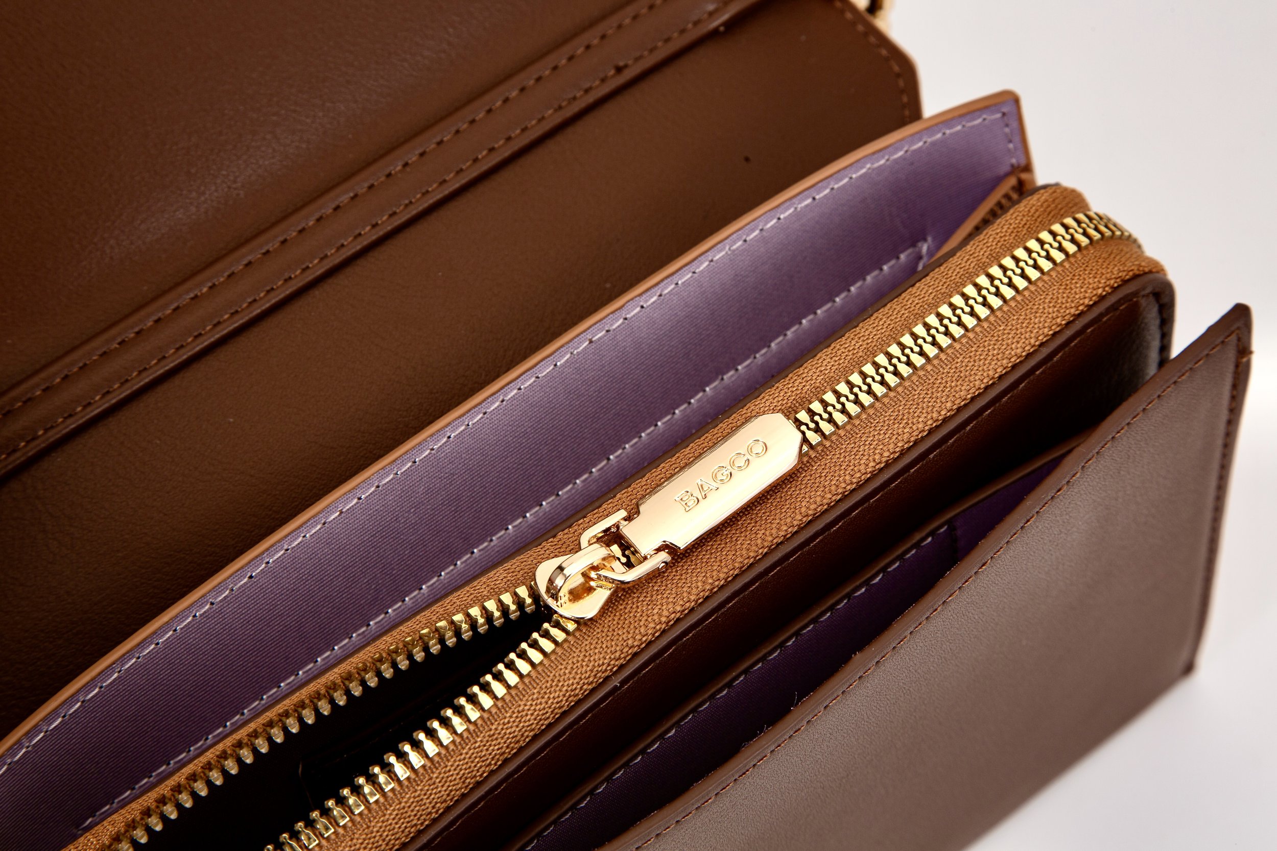 Statement Strap Minimalist Purse Brown Zipper Closure.jpeg