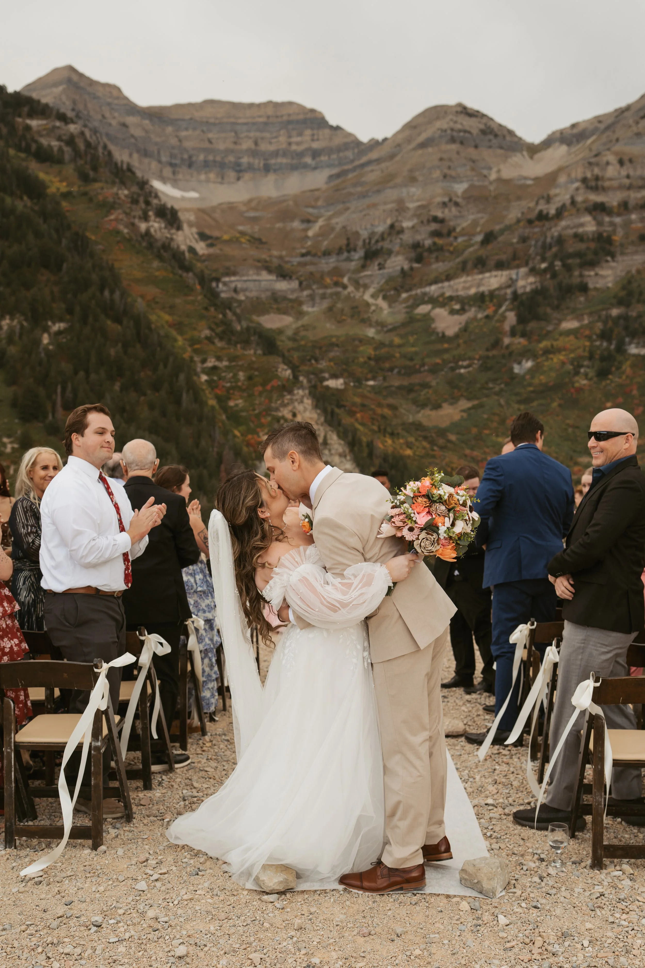 bride and groom kissing at the Mandan summit in Utah, Utah photographer