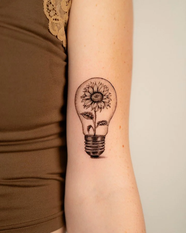 Staying positive and choosing better days. 🌻
&mdash;
DM us your idea. We&rsquo;ll guide you through the booking process.

Artist: [ @dd.tttoo ]

Fine Studio is a Seattle-based tattoo studio specializing in custom, high-end work. If you&rsquo;re sear