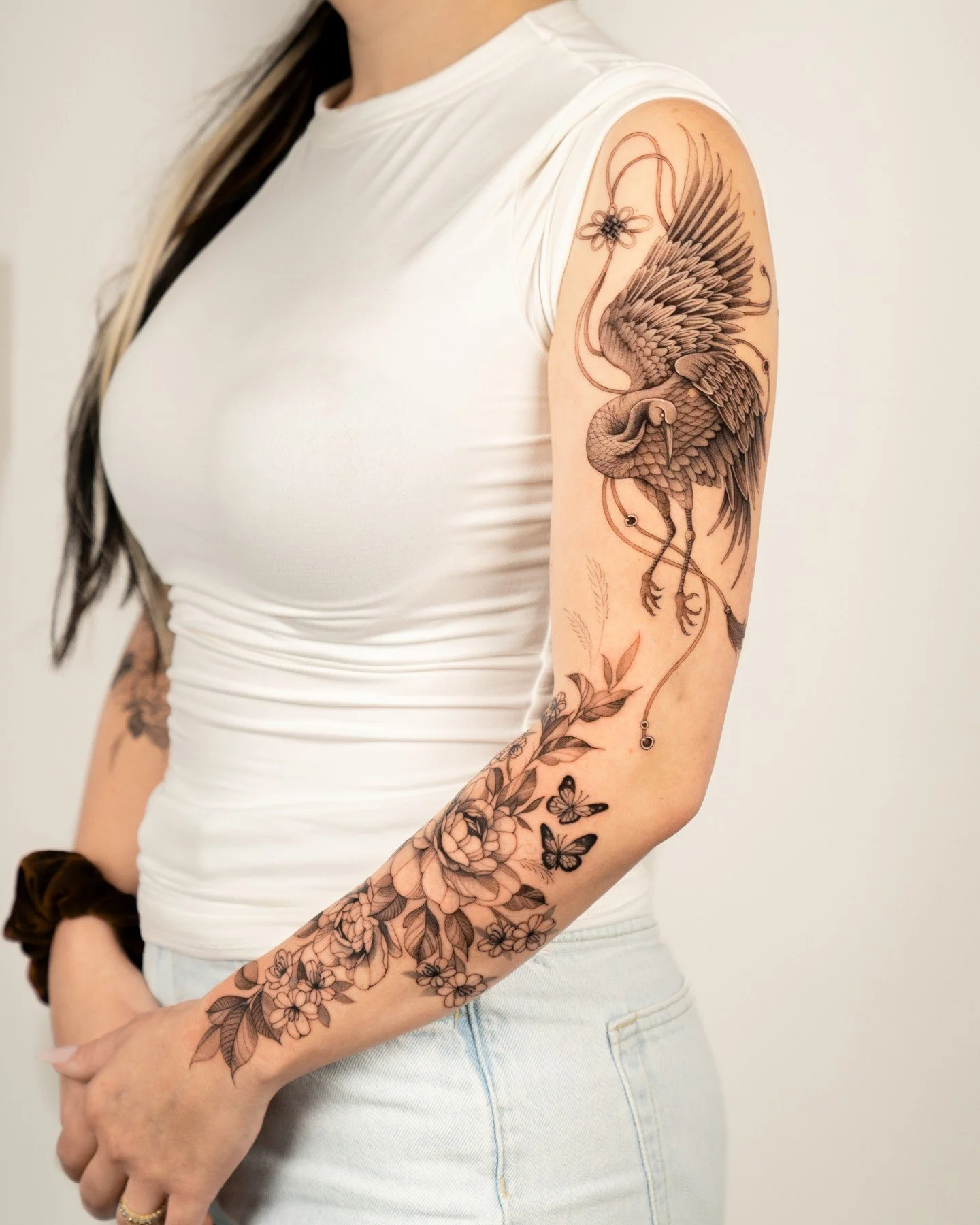 At @finetattoostudios. Ready for a new tattoo?
&mdash;
DM us your idea. We&rsquo;ll guide you through the booking process.

Artist: [ @fedetronconitattoo ]

Fine Studio is a Seattle-based tattoo studio where custom design meets art. This crane and fl