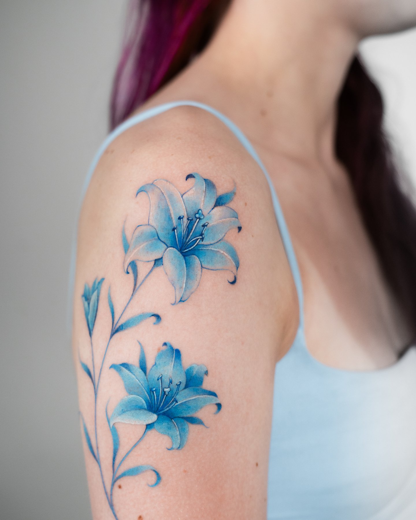 Blue was always the idea
&mdash;
DM to book.

Artist: [ @franka_tattoo ]

Fine Studio | South Lake Union, Seattle. Custom floral tattoos in soft color and black and grey, designed from scratch with botanical detail and natural movement. #lilytattoo #