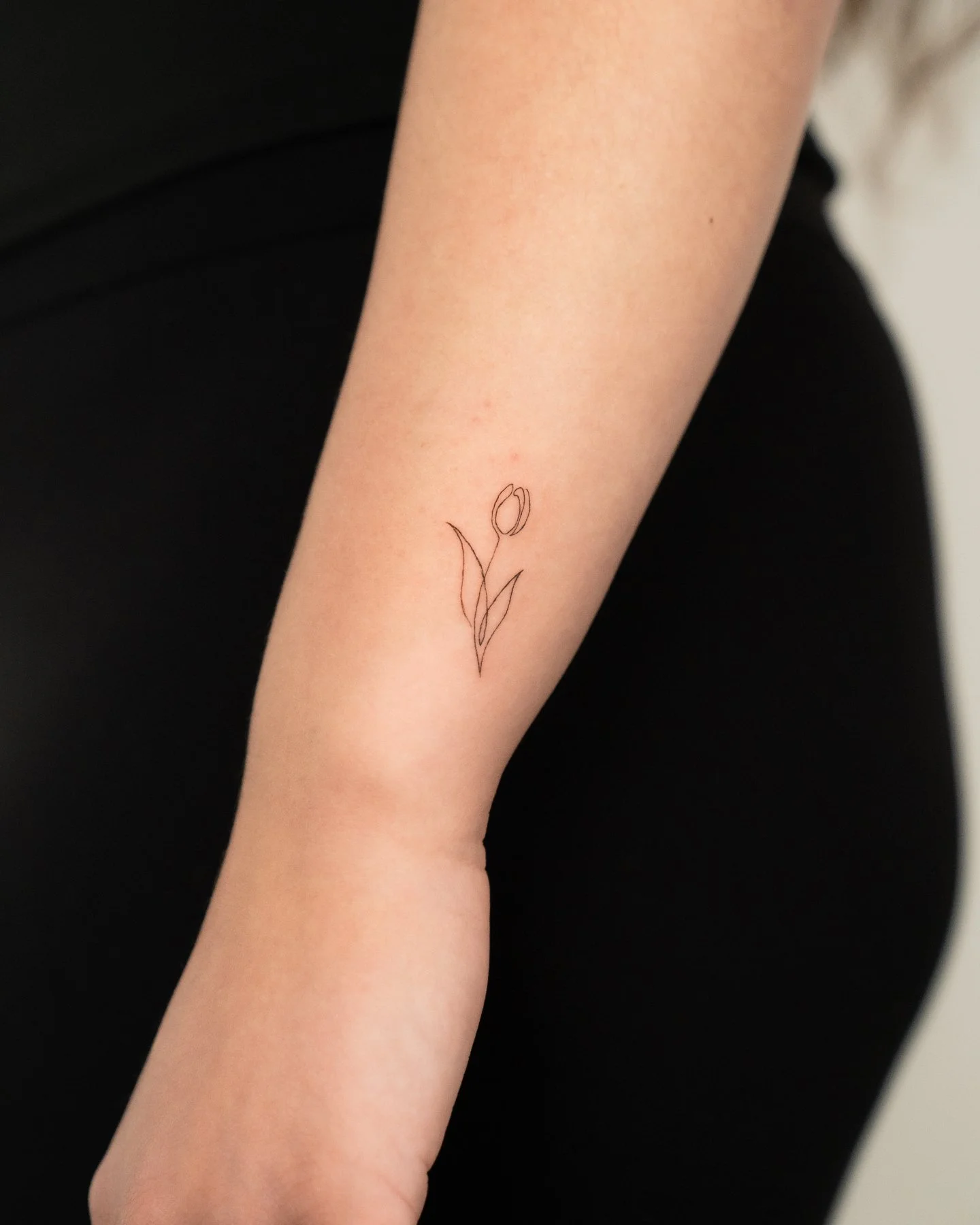 Fine line by Anisha
&mdash;
DM or email for inquiries.

Artist: [ @anisha.tattoo ]

Fine Studio | South Lake Union, Seattle. Custom fine line and tiny tattoos, designed from scratch with single needle detail. #tuliptattoo #finelinetattoo #tinytattoo 