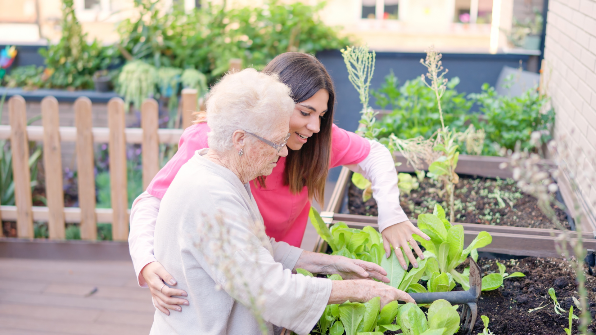 Modern wooden cabin with large window set against mountainous landscape