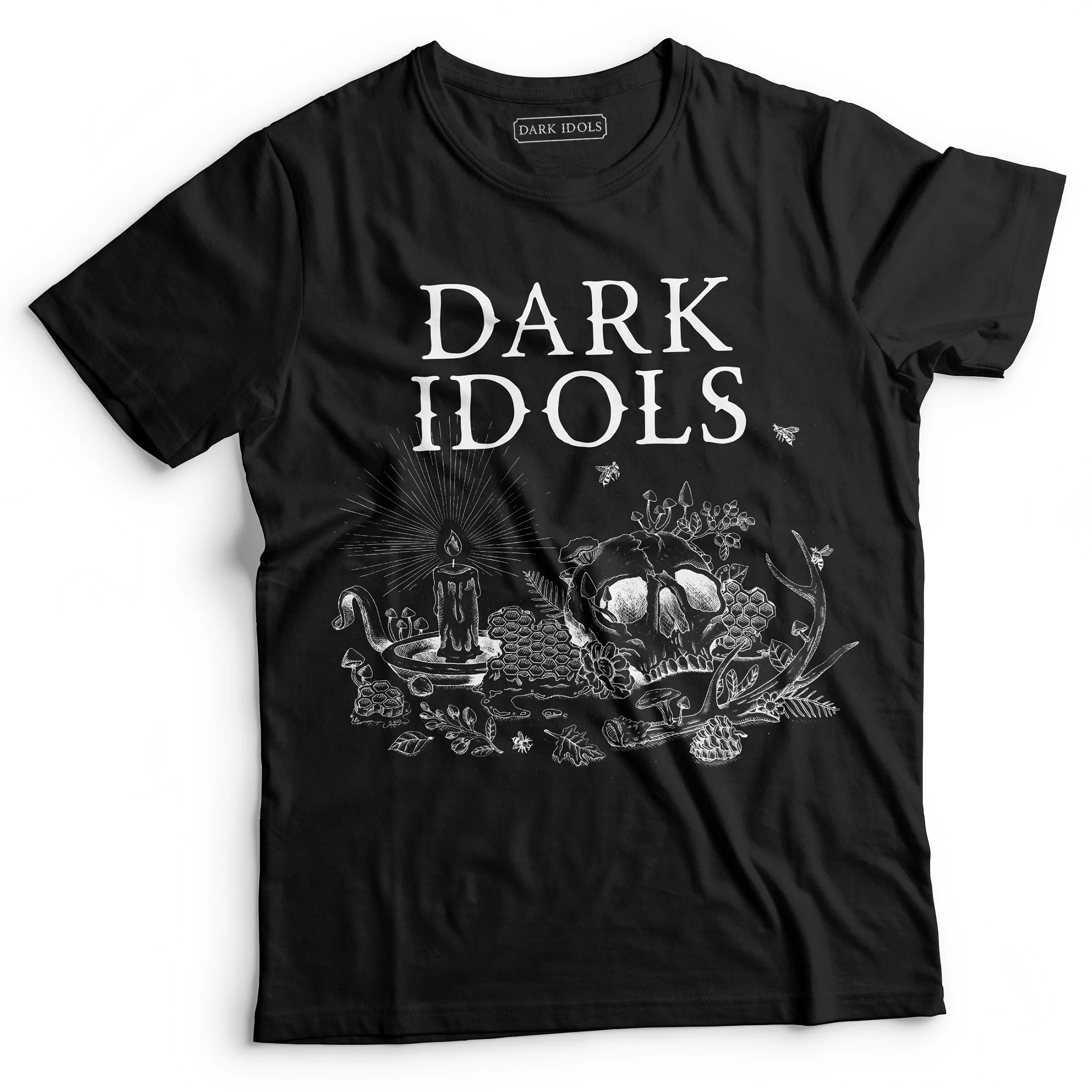 An image of a black t-shirt on a white background. On the front of the t-shirt, the "Forest Feast" artwork is printed in white, with the Dark Idols logo above.