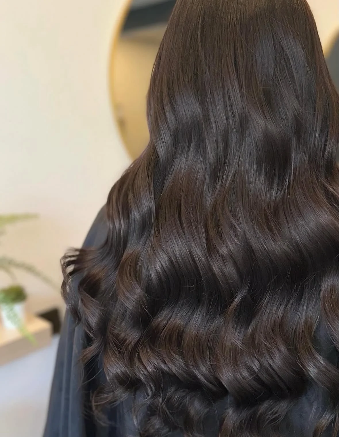 Long, dark &amp; shiny ✨ 
Can you believe this hair is 18 months old? 
We added in this weave for thickness and it has withstood the test of time! 
Paired with a root touch up &amp; glossing by @wella 🎨 
.
.
.
.
#hairextensions #hairextensiontips #h