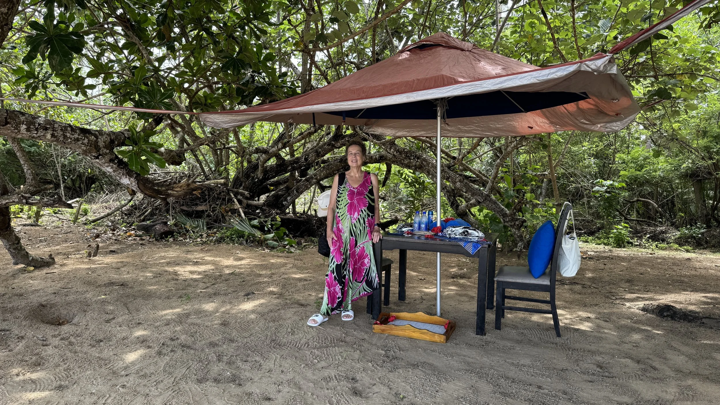 Table, chairs, and umbrella all brought to this secluded spot just for us