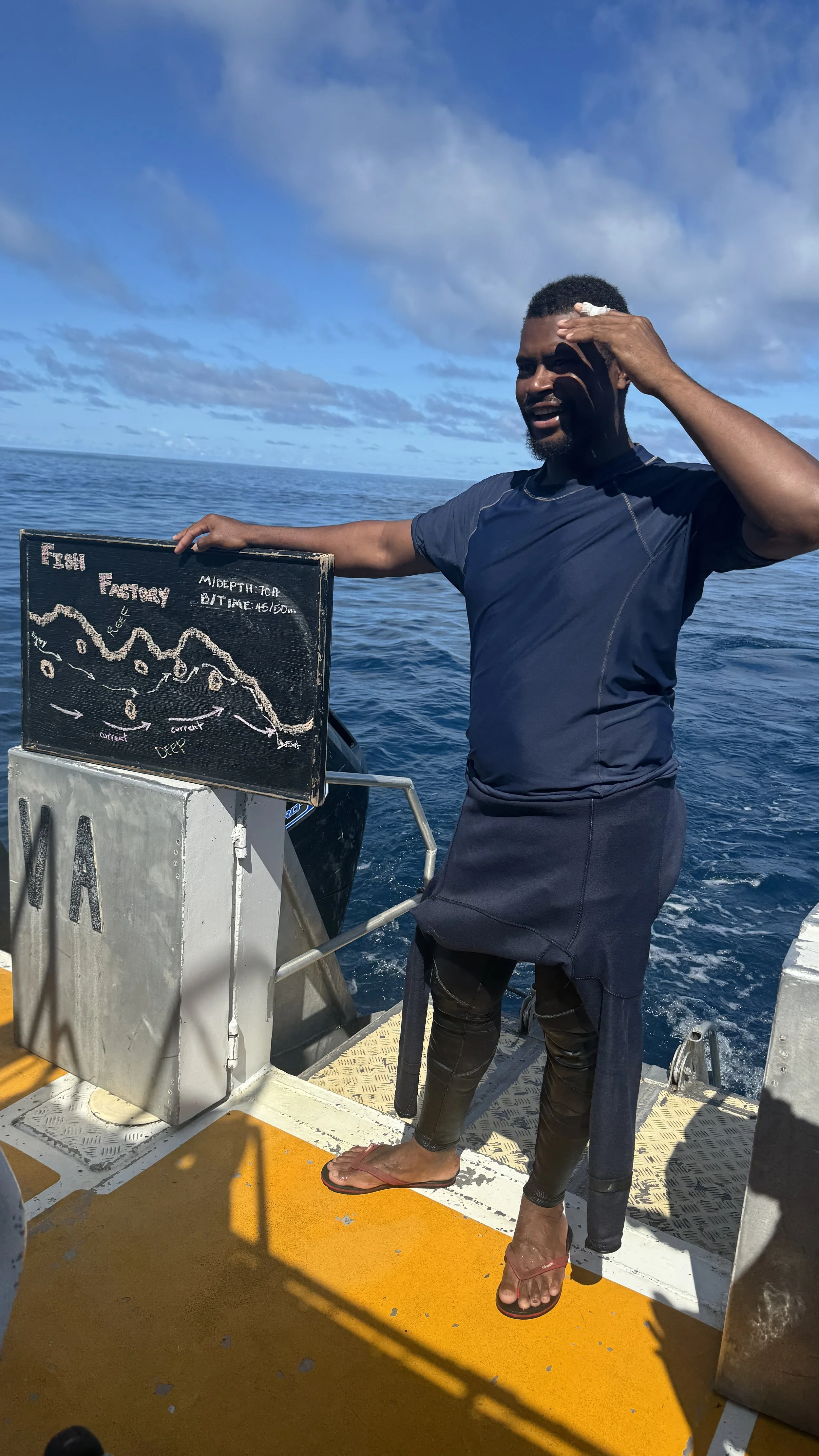 Uli was our divemaster, here explaining a dive site called fish factory
