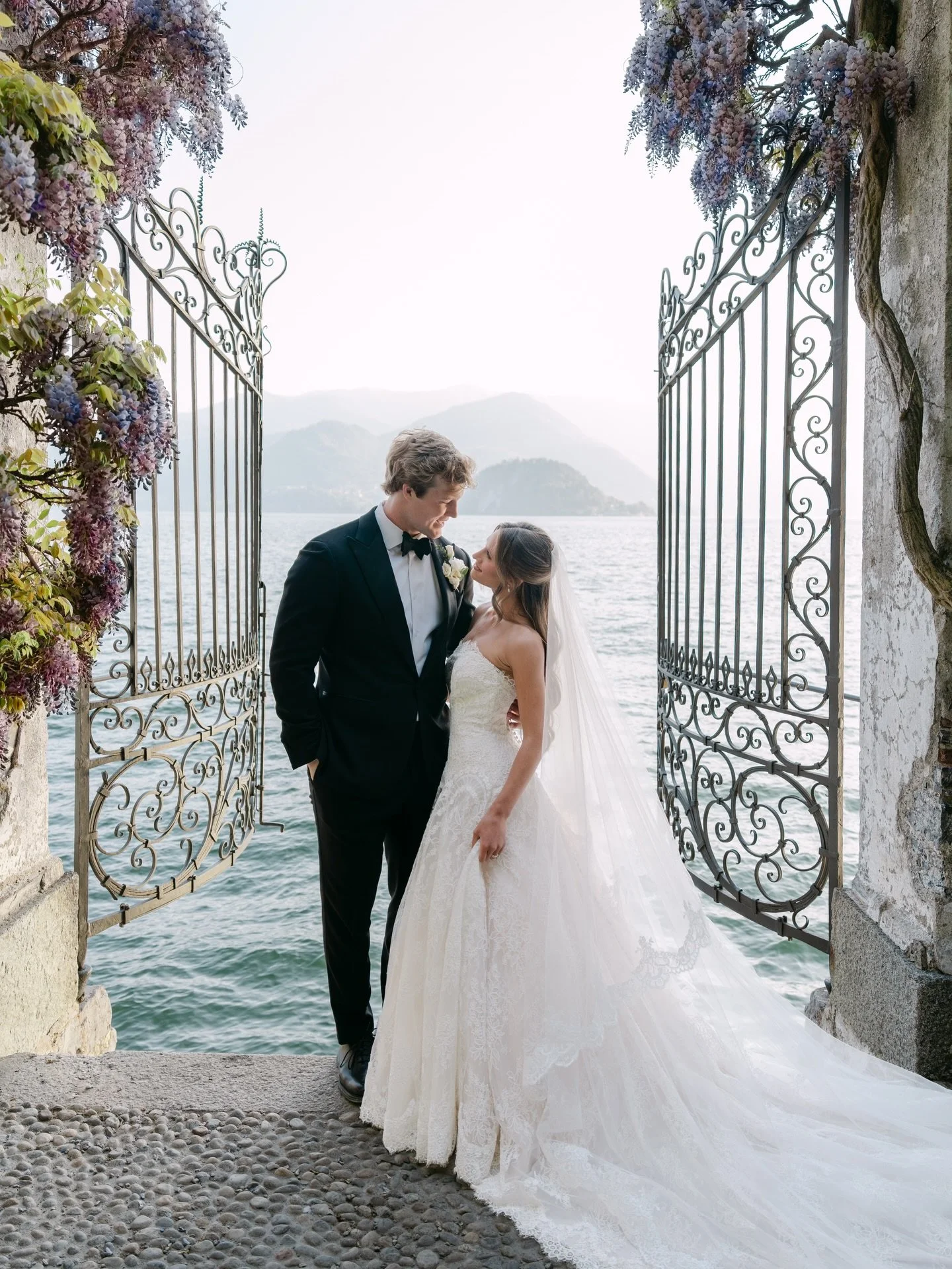 Maddie &amp; JD wrapped in the iconic wisteria blooms at Villa Cipressi 🌸
@maddieebertrand &amp; @jdbertrand1 
Planner @blisseventslakecomo 
Videographer @dk_wedding_film 
Second shooter @the.weisers 
Content Creator @kristina_belihina 
Hair stylist