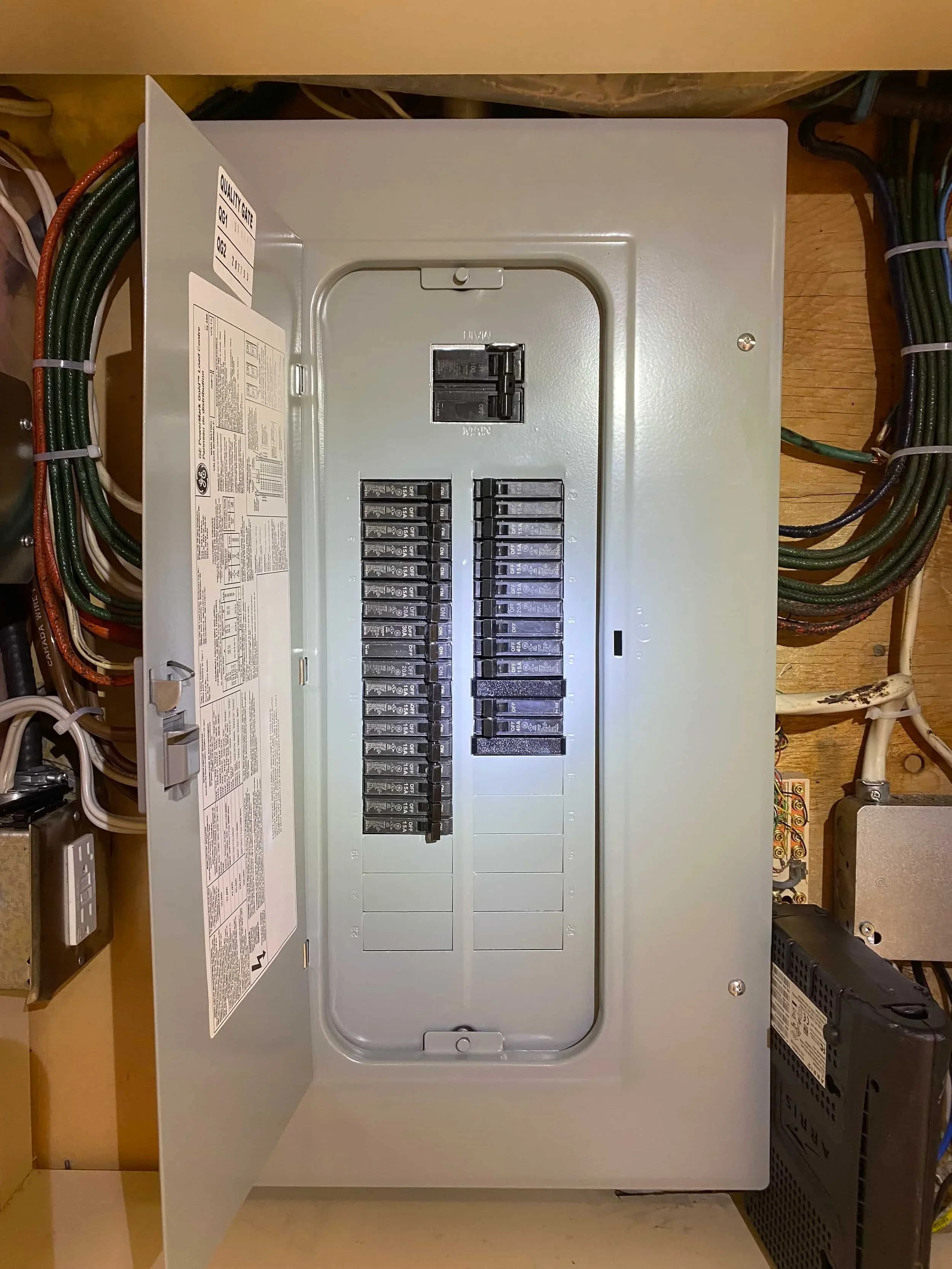 100 amp panel replacement with new breaker box installed in Calgary by FuseSmart Electric.