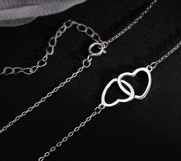 DOUBLE HEART NECKALCE - STAINLESS STEEL .png