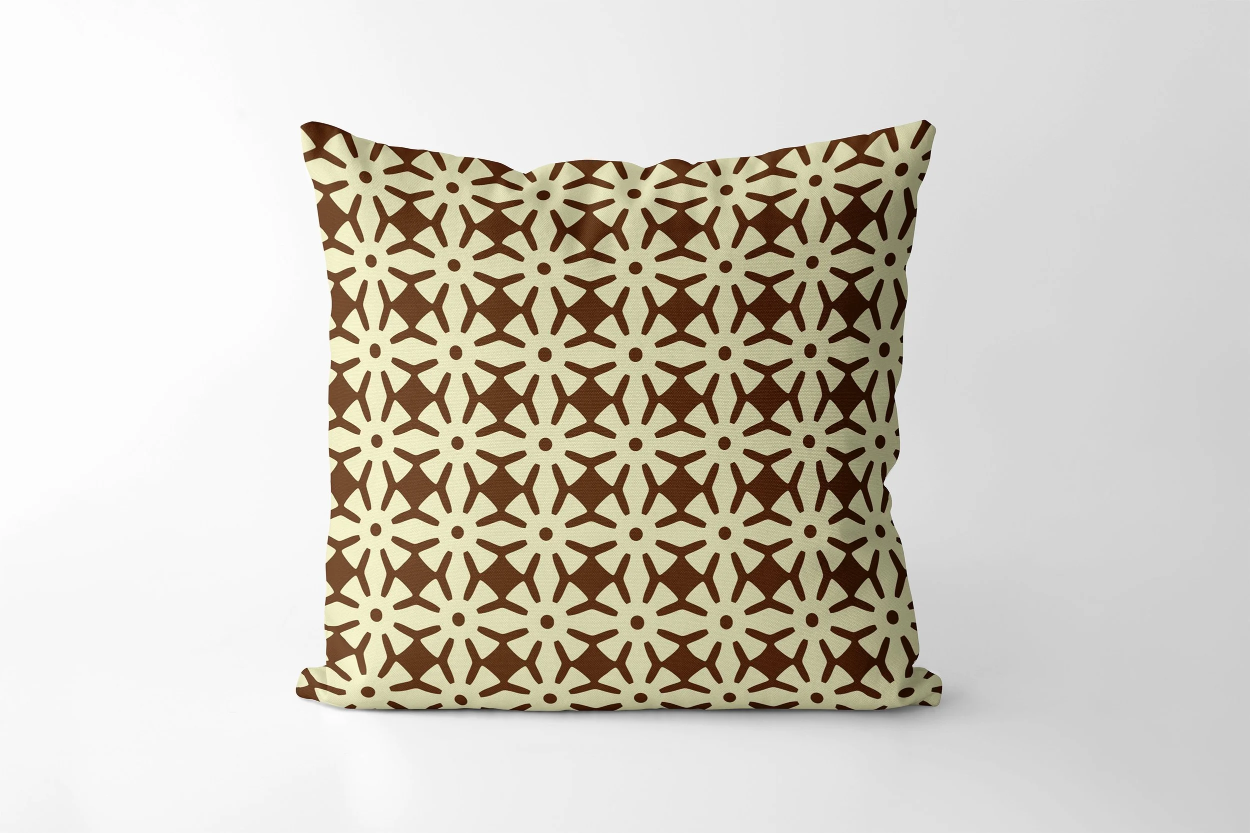 Ananse Ntontan cushion in cream and chocolate.