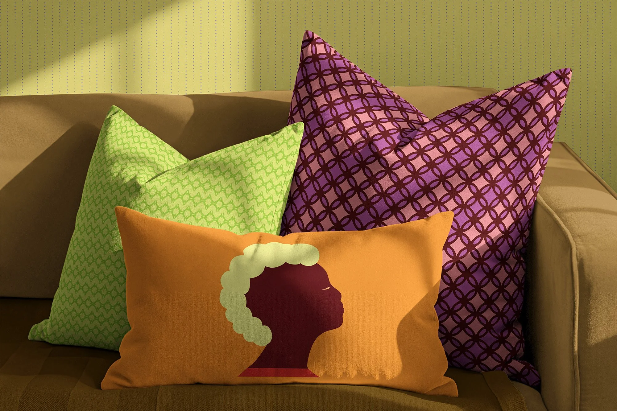 Cushions in kiwi, caramel, and plum, with Glimmer wallpaper in kiwi.