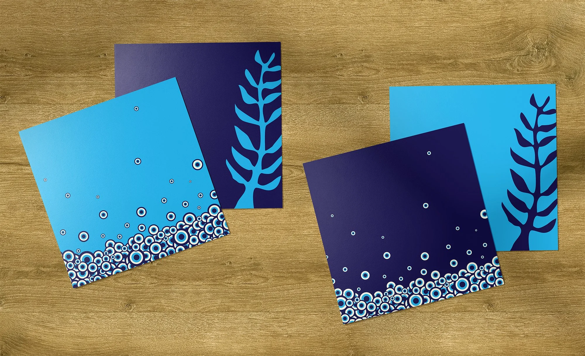 Adinkrahene and Nyame Nti note cards in aqua and navy.
