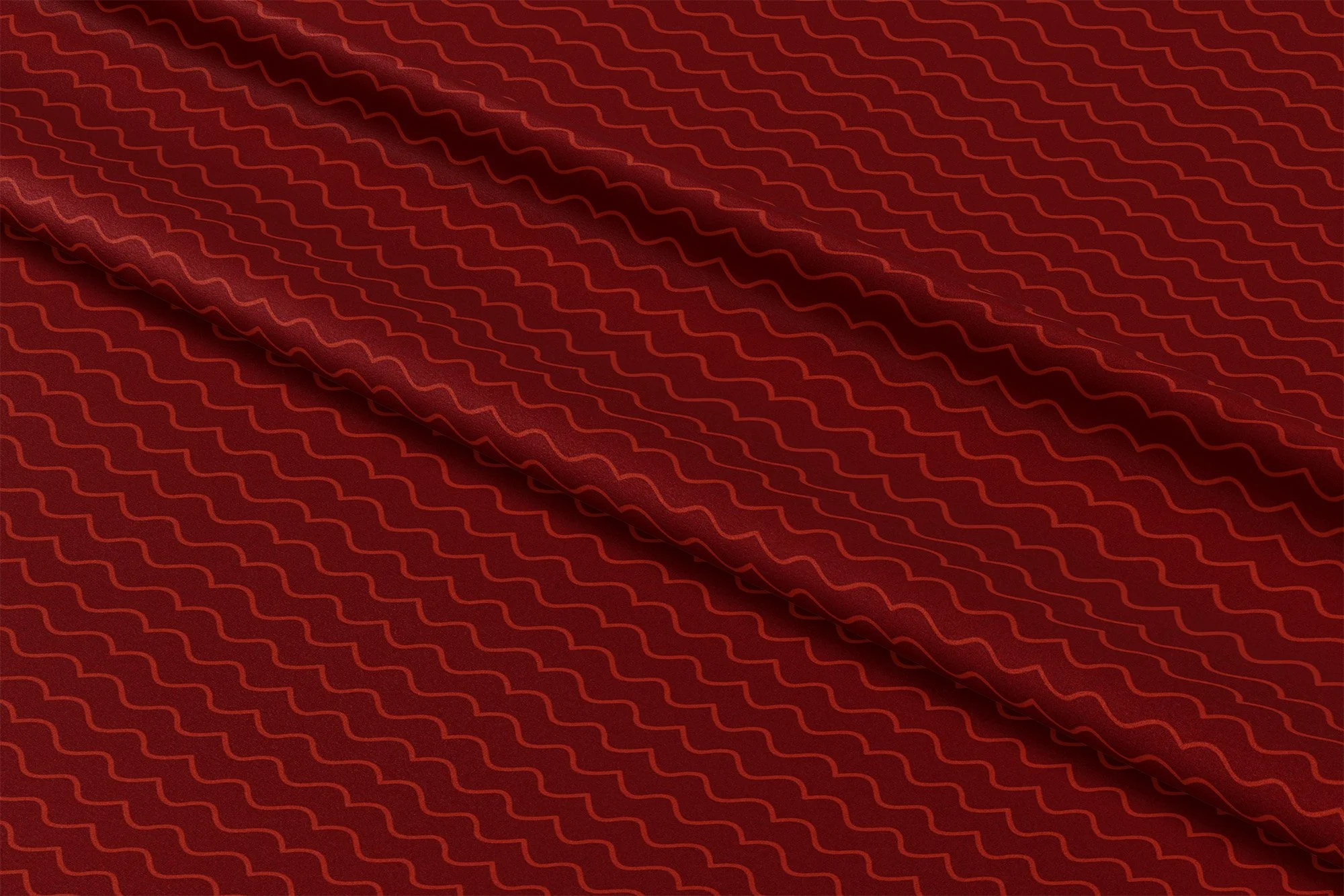 Nsuo pattern in caramel, inspired by the Adinka symbol for water and life force.