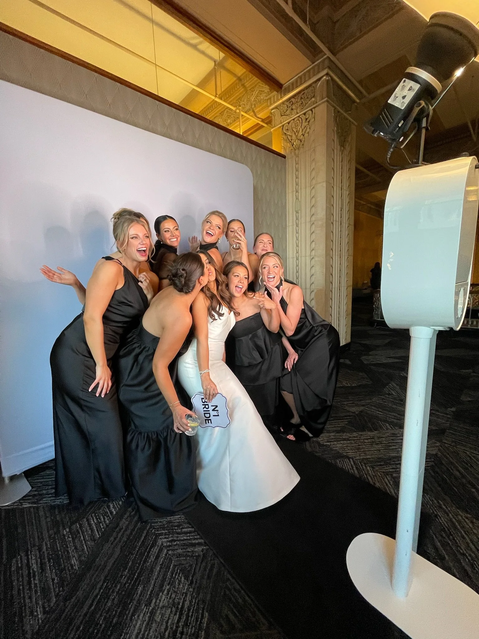 Real Kansas City wedding couple with their Lumen Events photo booth experience
