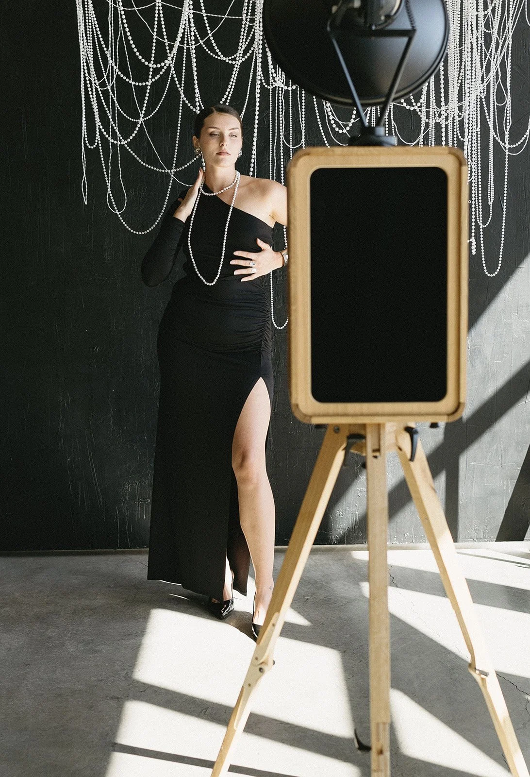 : Luxury photo booth setup by Lumen Events Kansas City featuring elegant Pearl booth design at a wedding reception