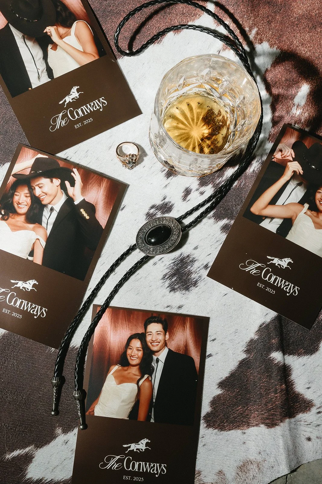 Custom photo booth backdrop and design details at a Kansas City luxury wedding Placement: After the paragraph about custom backdrops complementing florals and color palettes. Shows the level of design customization.