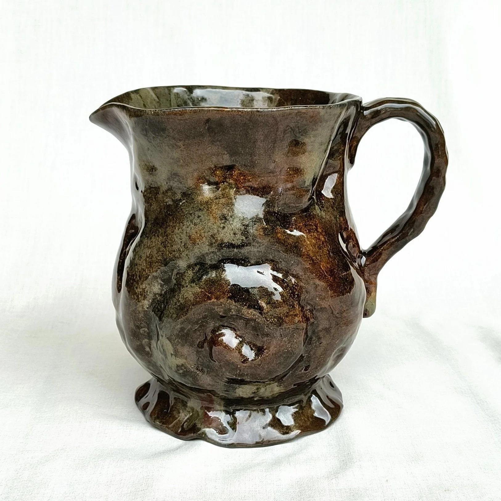 Shell Pitcher, brown stoneware, 2025