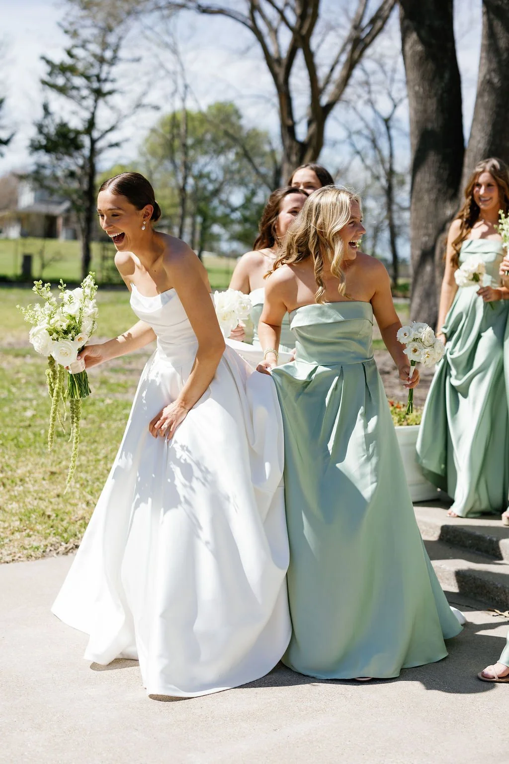 Wedding party flowers by Dallas Florist, Haute Poppies Floral, with an all white color palette