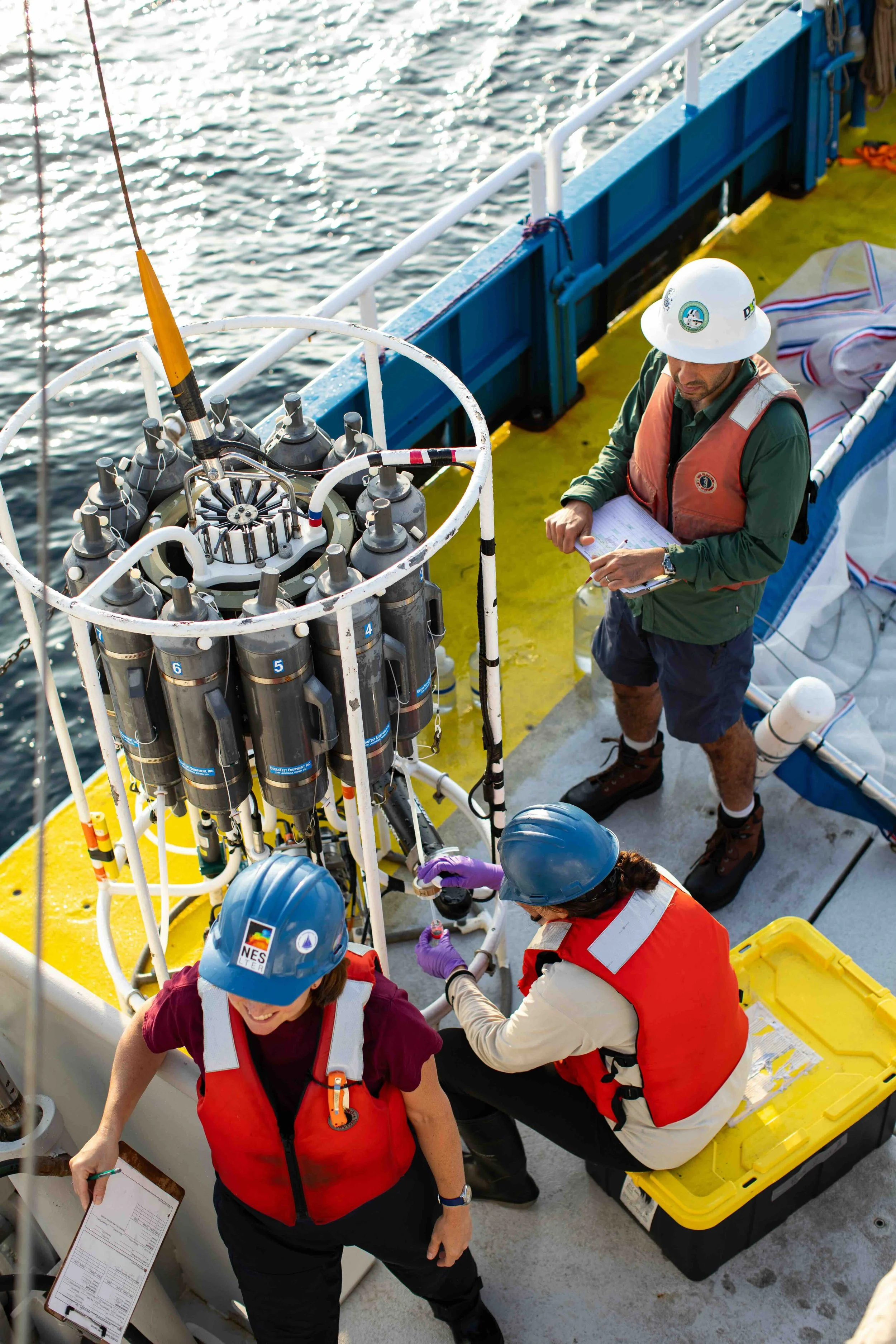 Collecting samples and data from the CTD rosette after recovery