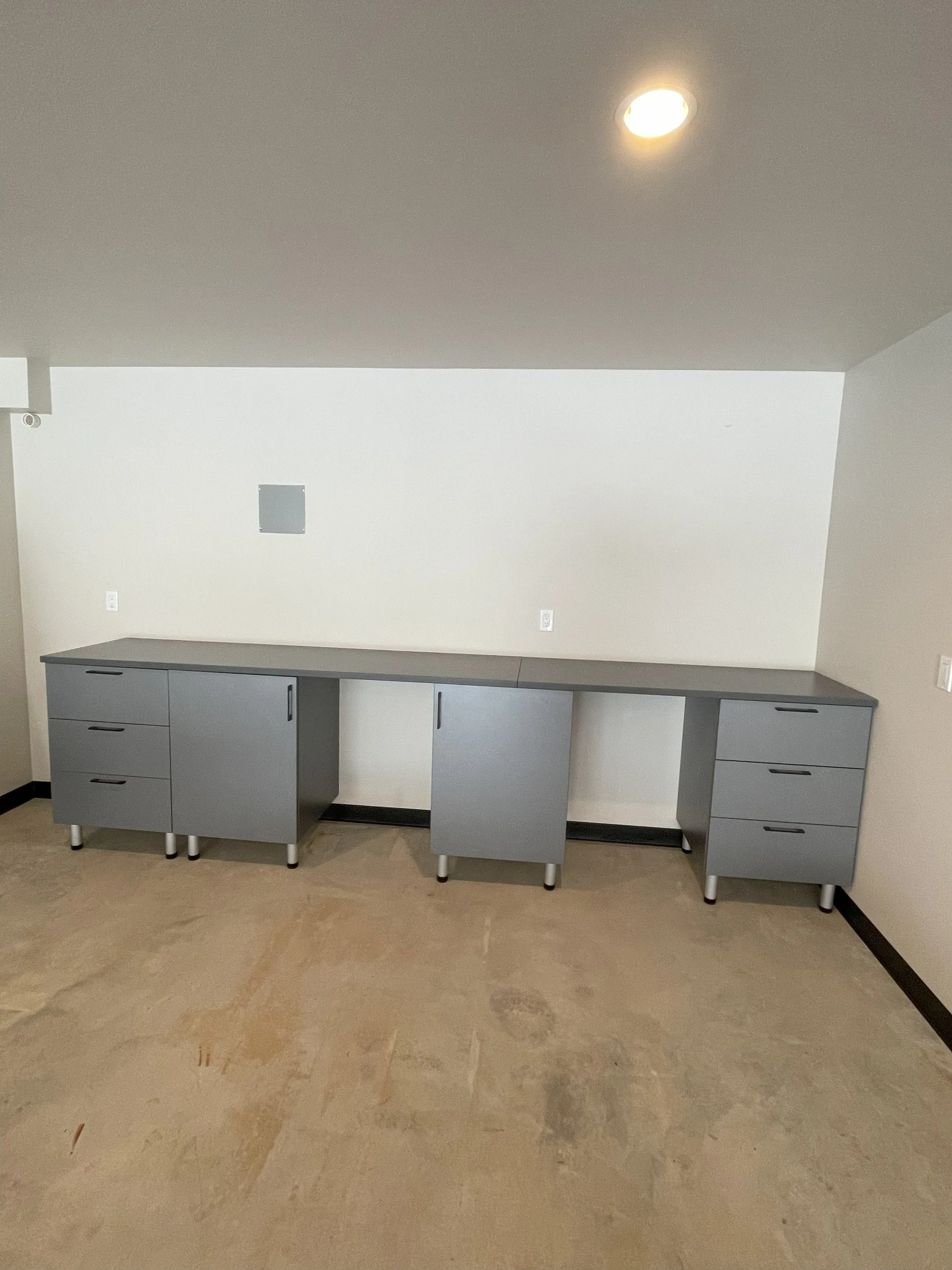 custom garage cabinets and long workbench
