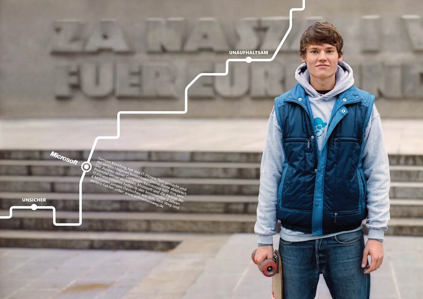 Young man wearing a blue vest and holding a skateboard