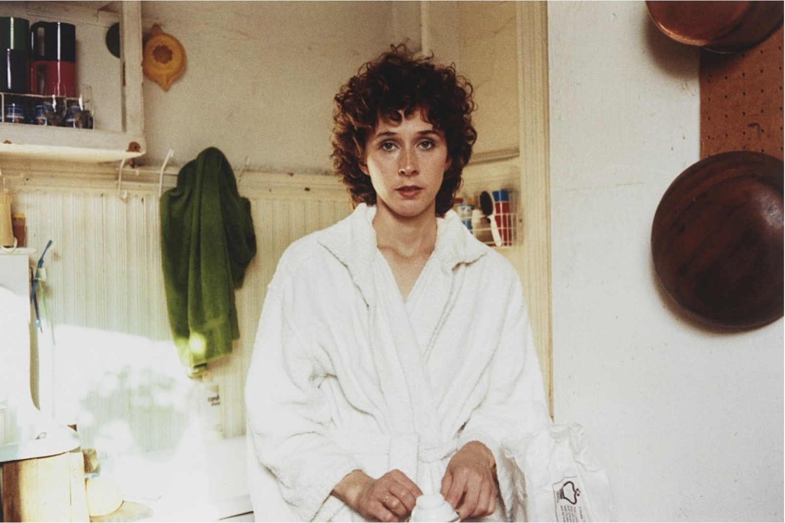 Butch Walker in a white bathrobe gazing at the lens, photographed by Allen Frame