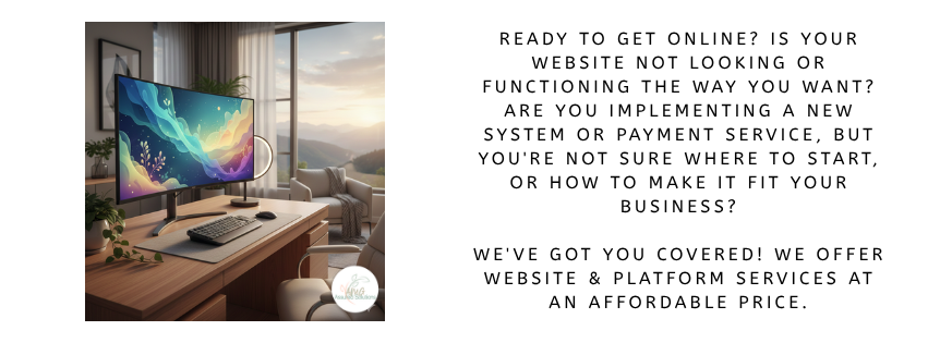 A modern home office with a large monitor on a wooden desk, a keyboard, and a mouse, with a window showing a scenic view of mountains and a sunset.