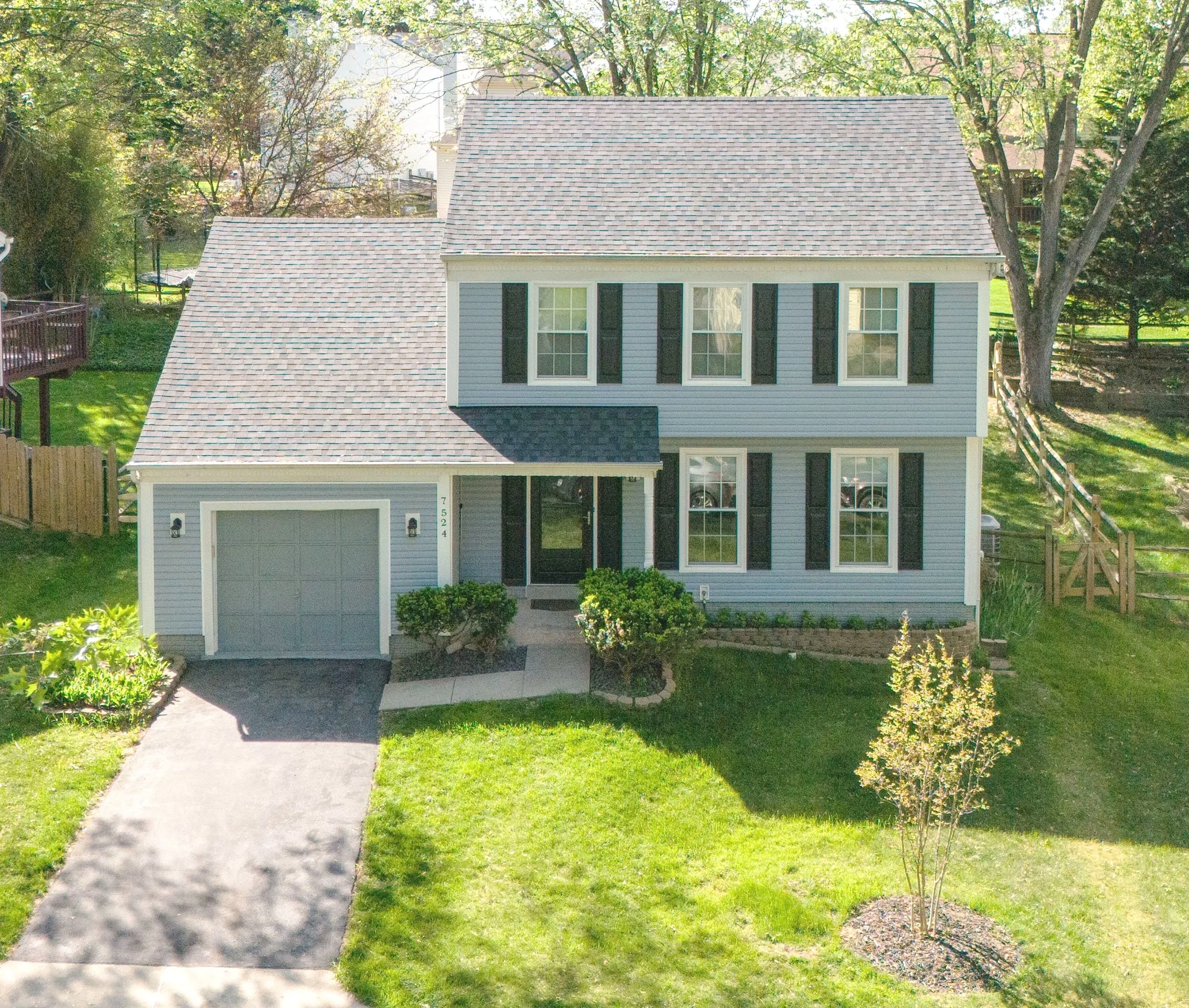 20250729-4seasonshome-rockville-grey-asphalt-shingle-roof-blue-siding-blue-shutters-2500.jpg
