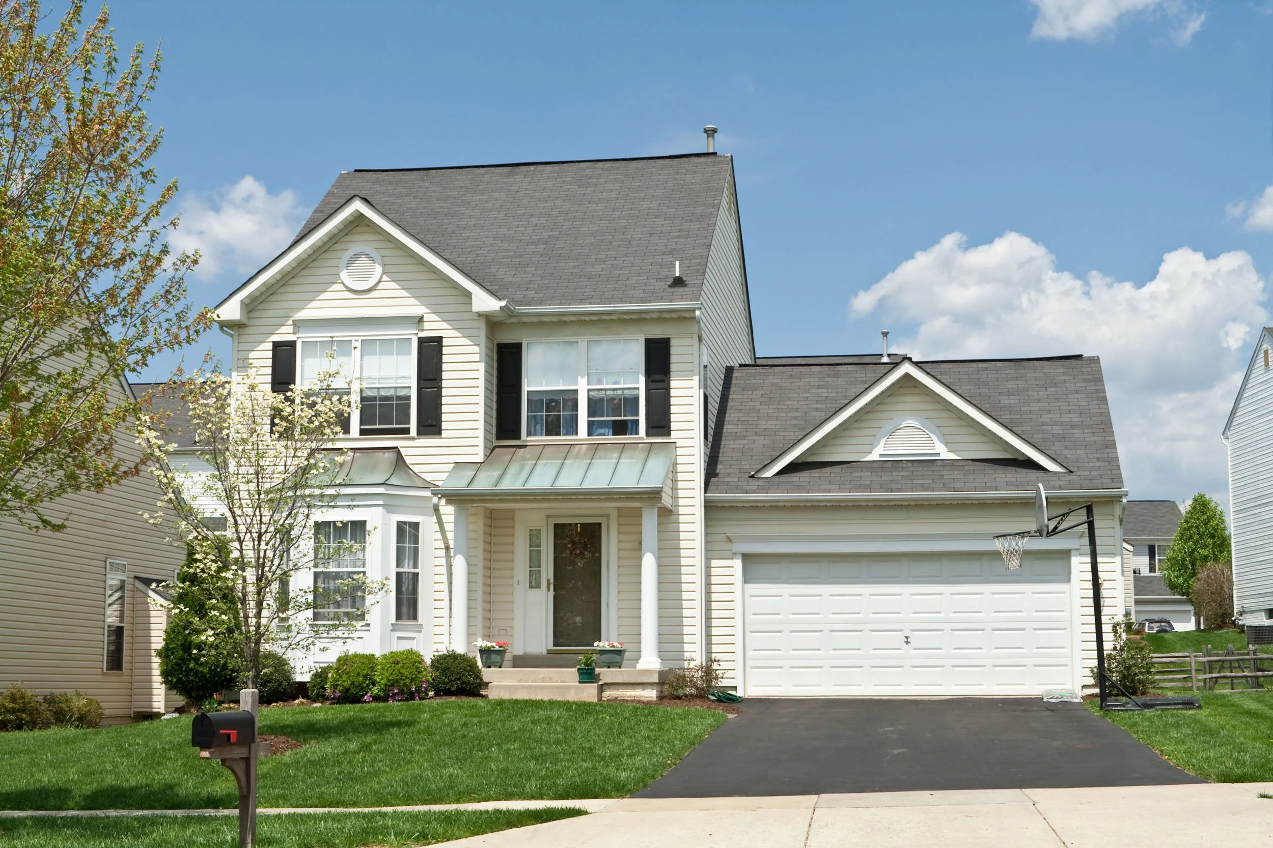 20250713-4seasonshome-rockville-facade-front-door-covered-porch-window-shutters-roof-siding-professional-installation-2500.jpg