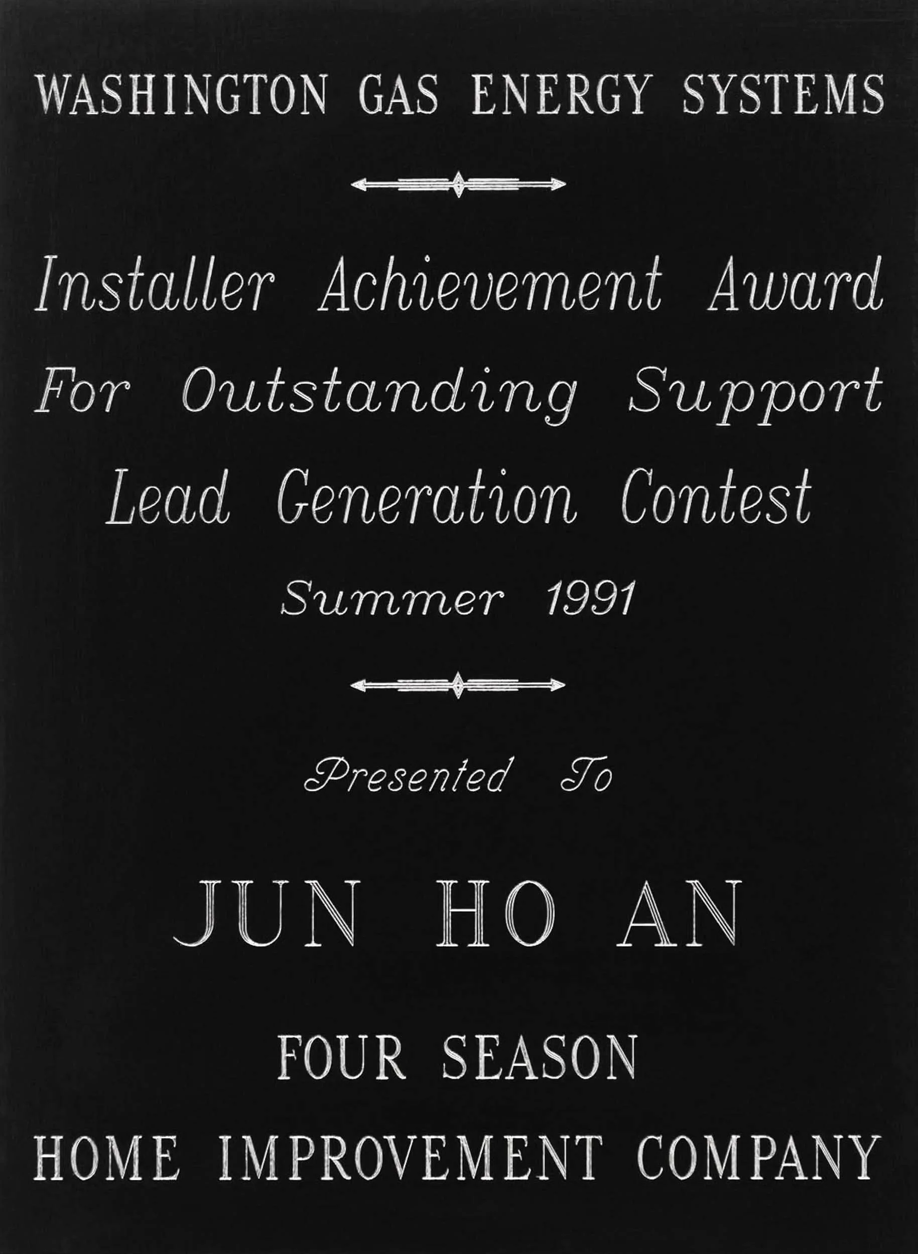 Black plaque with white text awards, acknowledging installer achievement support lead generation contest, summer 1991, presented to Jun Ho An, Four Season Home Improvement Company.
