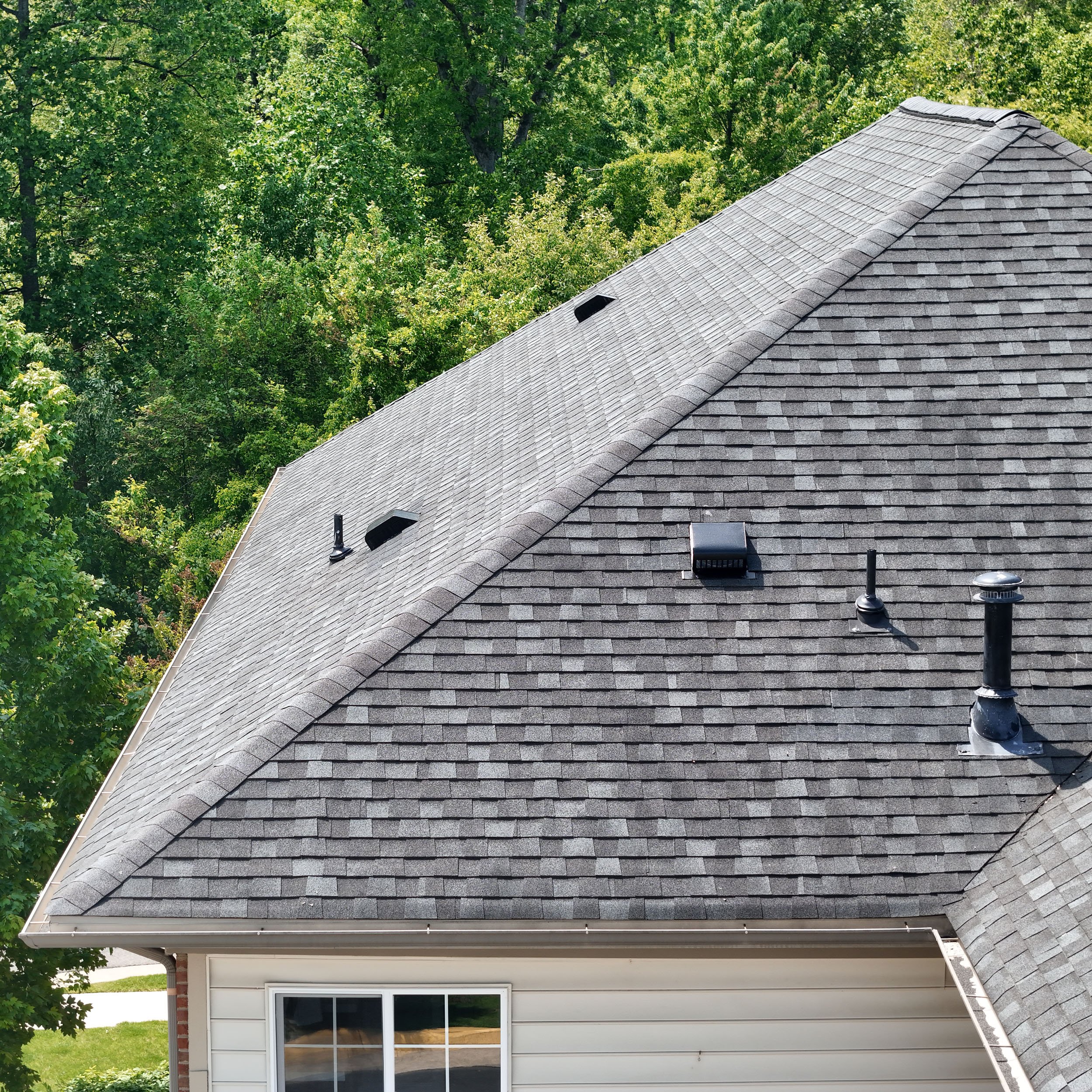 20250724-4seasonshome-rockville-grey-asphalt-shingled-roof-seamless-installation-overhead-2500x2500.jpg