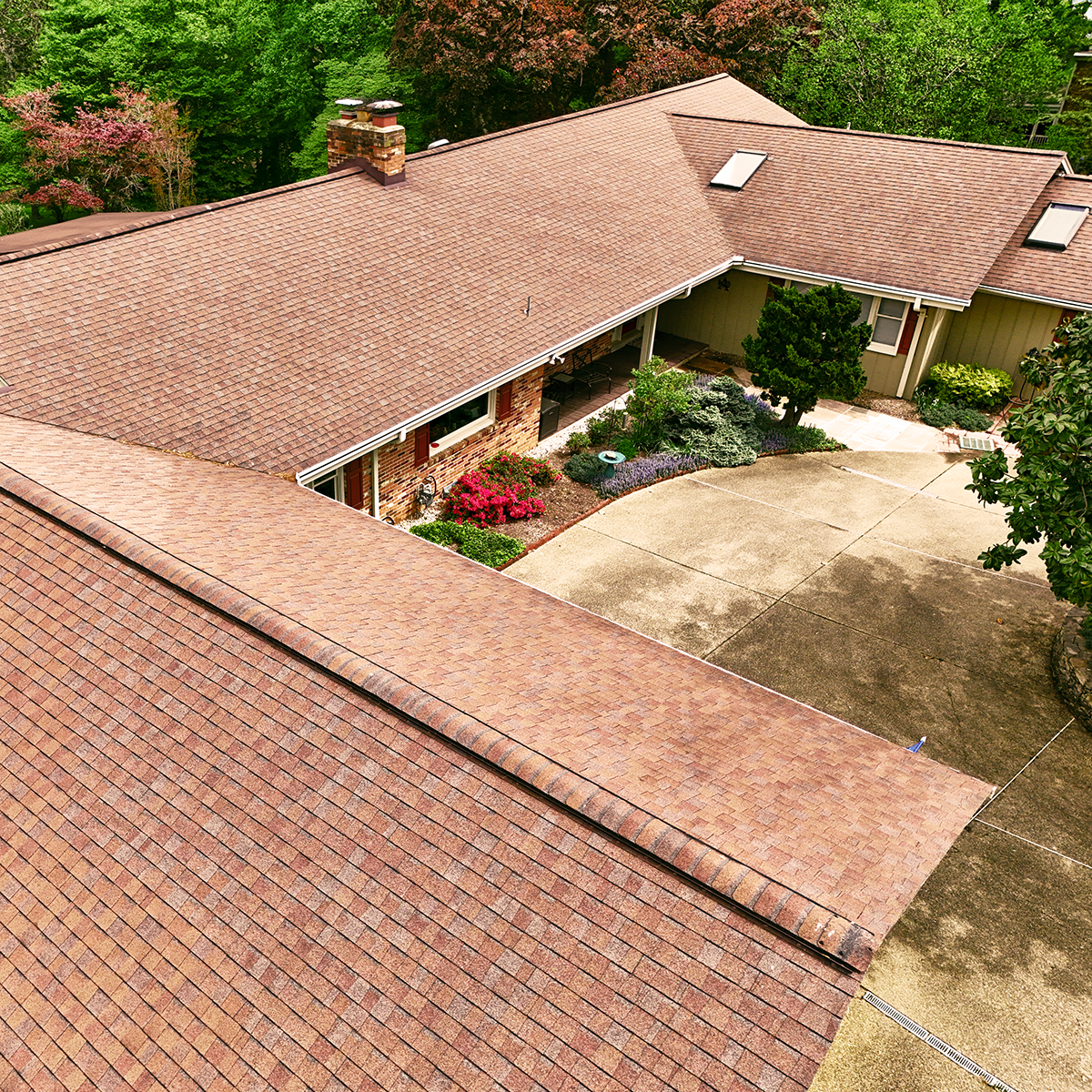 20250430-four-seasons-home-improvement-rockville-md-red-asphalt-shingle-roof-skylight-armantrout-high-angle.png