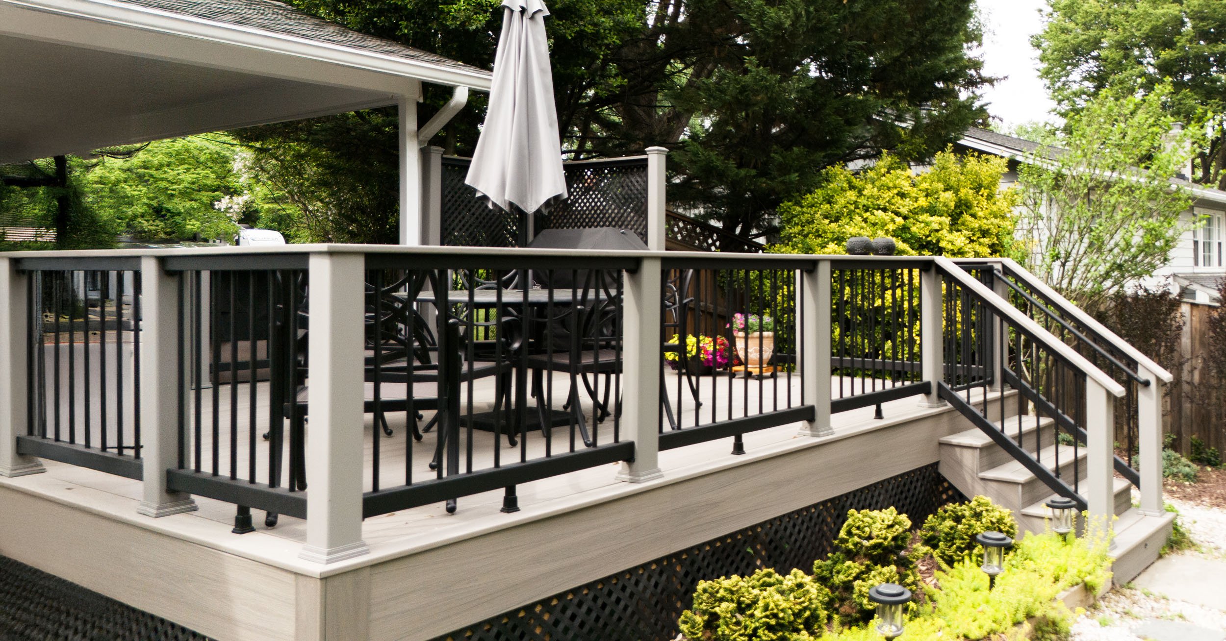 2025026-4seasonshome-rockville-certified-trexpro-deck-with-railing-steps-installation-angled-2-2500x1308.jpg