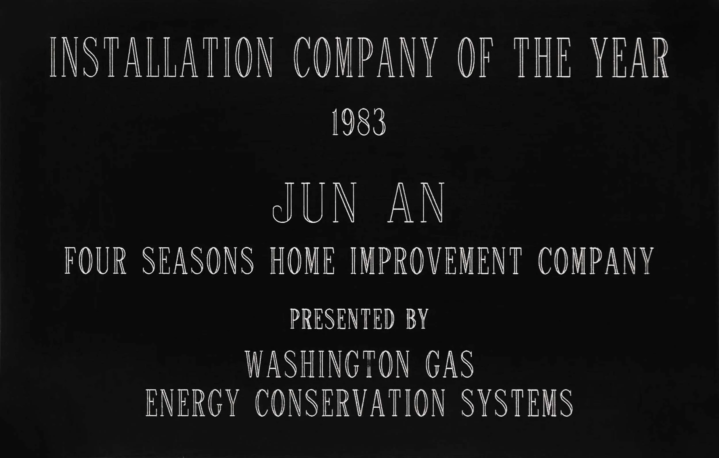 Award plaque titled 'Installation Company of the Year 1983' presented by Washington Gas Energy Conservation Systems.