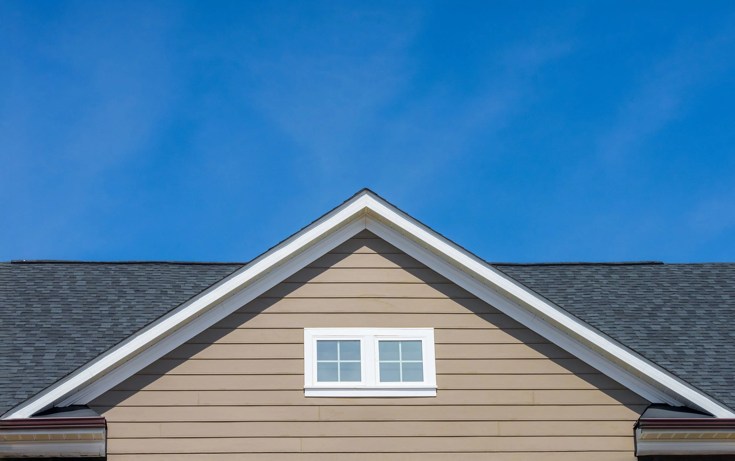 20250731-4seasonshome-rockville-brown-vinyl-siding-white-trim-gutter-grey-roof-professional-installment-2500.jpg