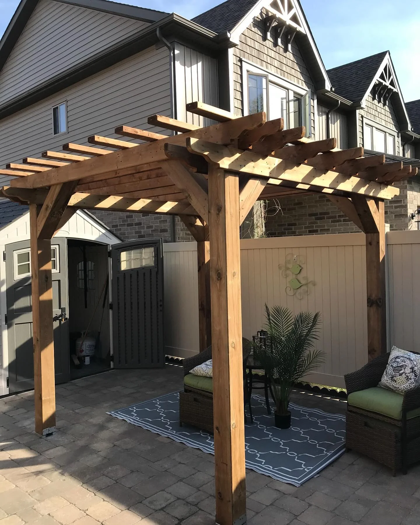Bringing the coziness of indoors outside. 

#backyardliving #pergola