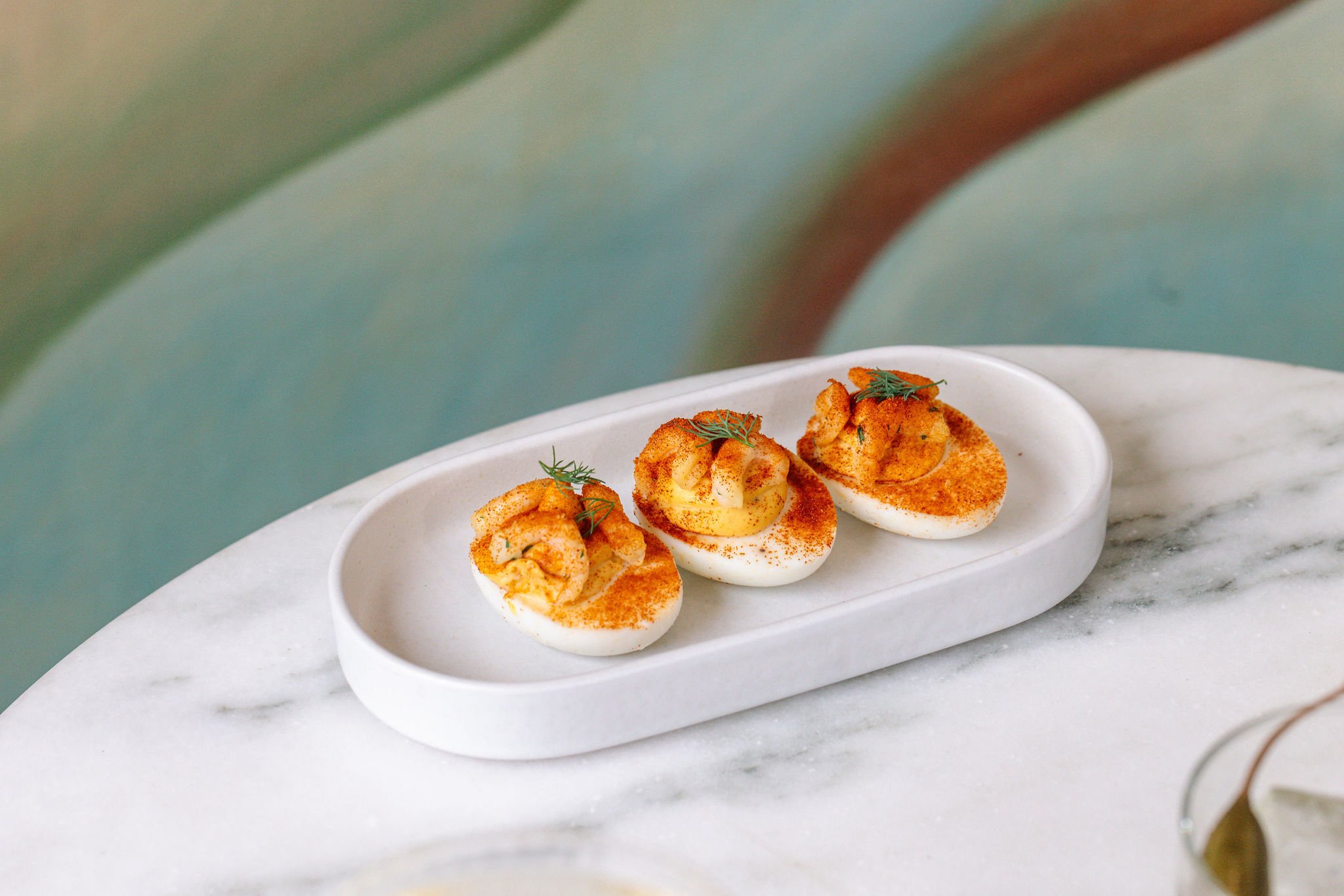 Gourmet deviled eggs at Shy Shy in Chelsea, NYC. A classic yet elevated small bite, perfect for pairing with craft cocktails