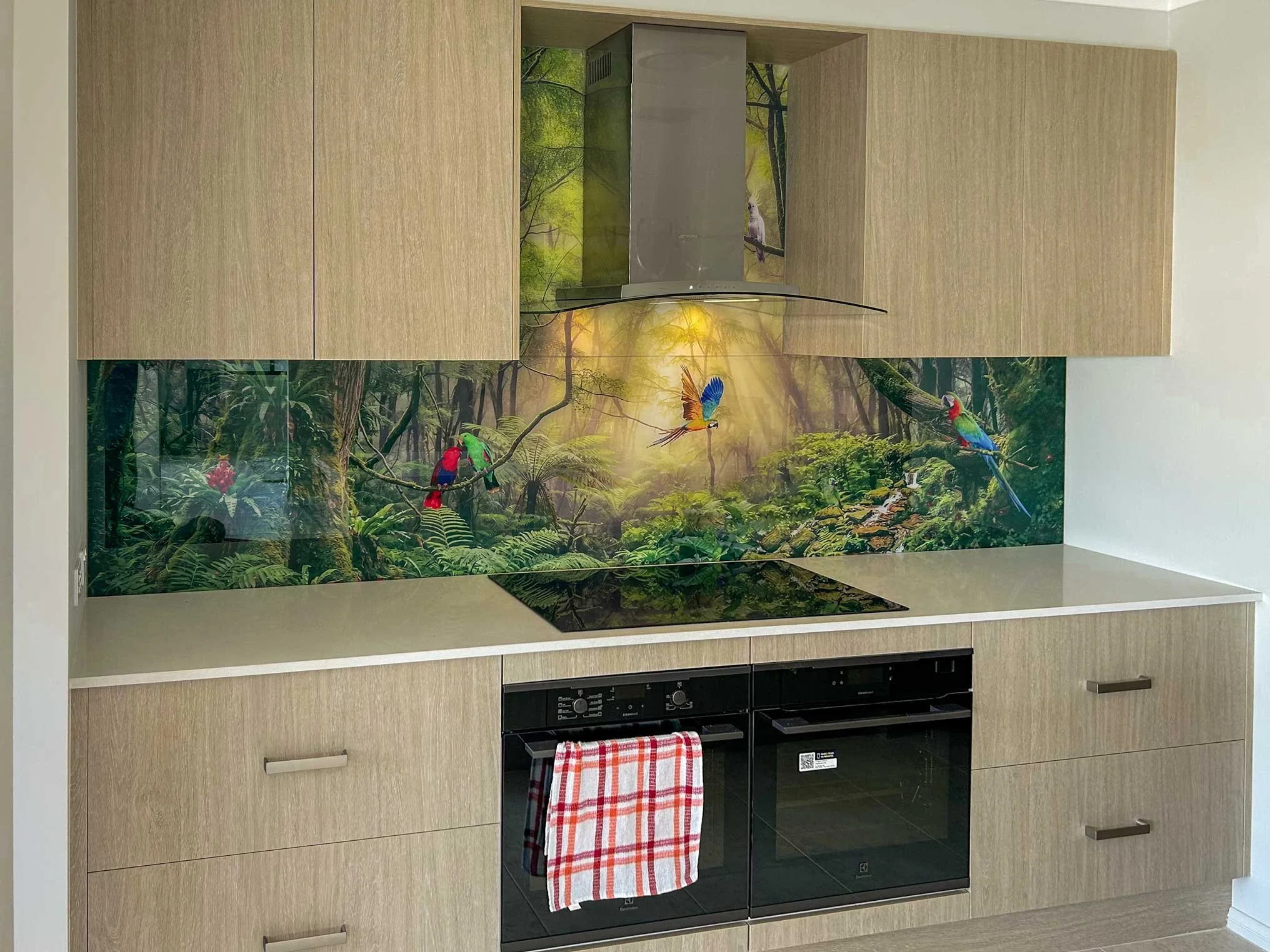 custom printed glass splashback with morning rainforest theme