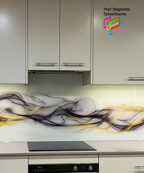 abstract design glass splashback in a white kitchen