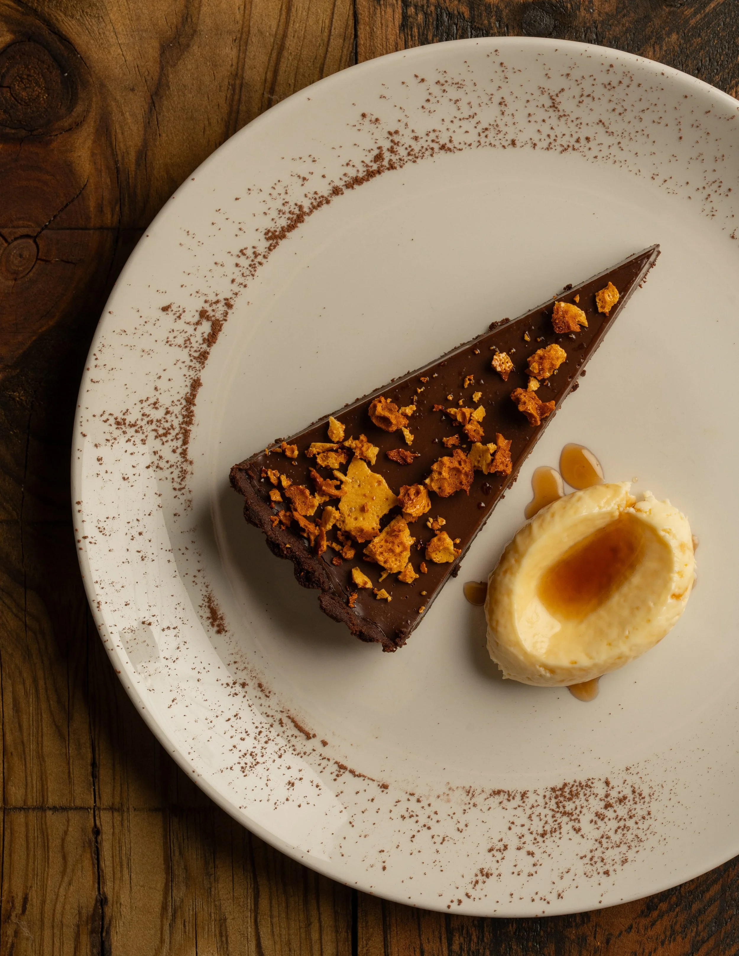 Valrhona chocolate tart with native honey and vanilla cream