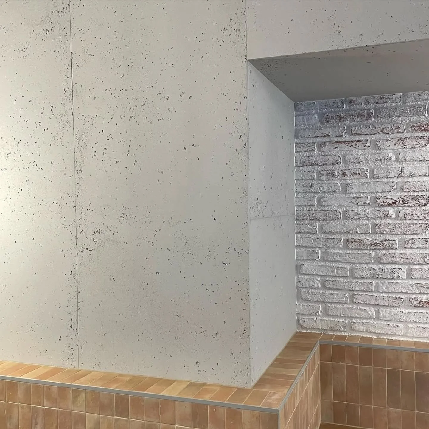 Stonini Pitted Concrete.  A modern classic &amp; a great way to start the week!  Thanks @stonini_panels for this share of one of your Aussie projects - STONINI Pitted Concrete has elevated everything in Hong Kong from workplaces through to beverage o