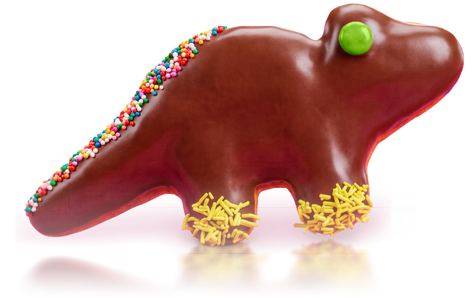 Chocolate-covered cookie shaped like a dog with colorful sprinkles and yellow sprinkles on its paws, and a green dot on its nose.