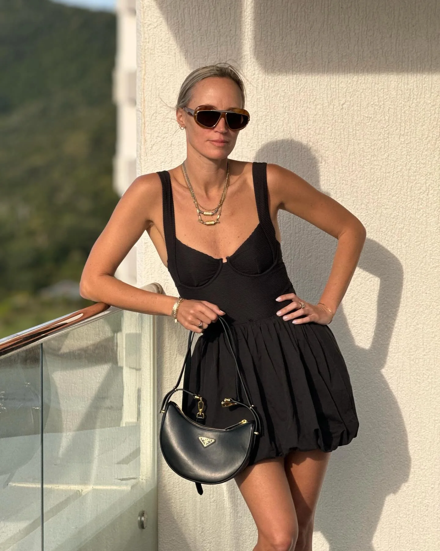 Island vibes 🌴
@loewe sunglasses 
@elceswim 
@dissh skirt
@prada bag
