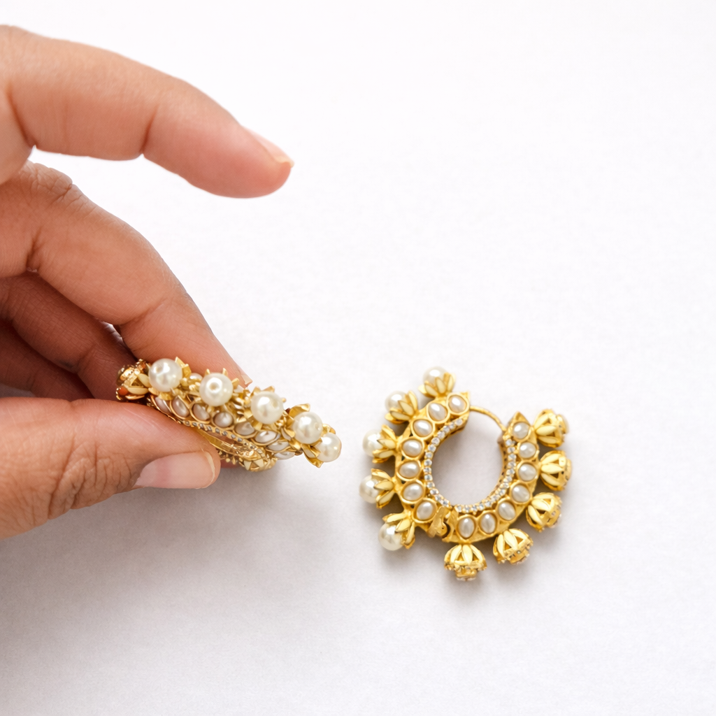 Kundan Hoops Pearl Neutral Background Hands 2.png