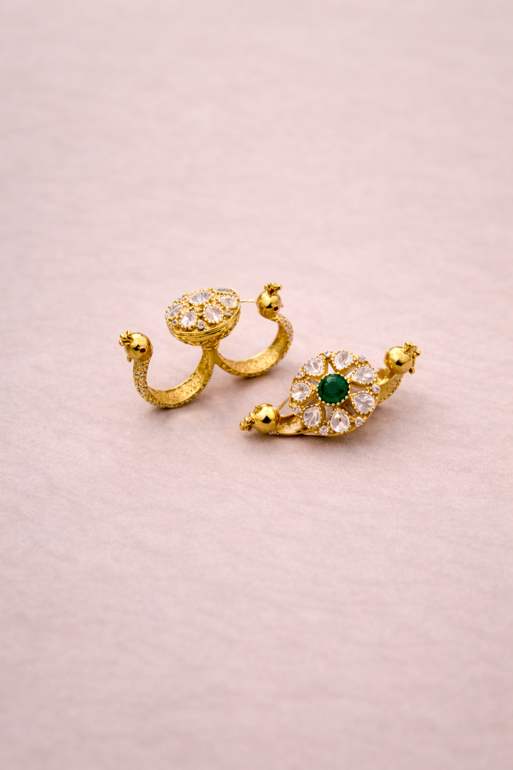 Double Peacock Rings Neutral Background White and Green.png