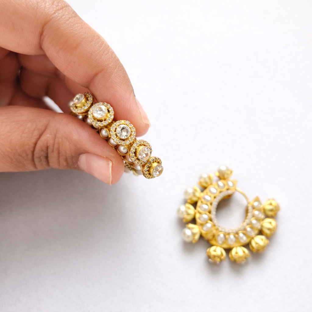 Kundan Hoops Pearl Neutral Background Hands 3.png